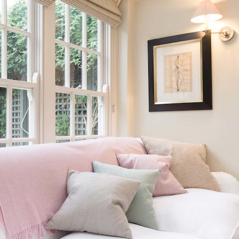 Snuggle up in the bright and breezy conservatory after a long day exploring