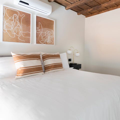 Get a restful night's sleep in the cosy mezzanine bedroom