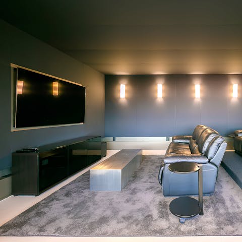 Come together to watch your favourite flick in the movie room
