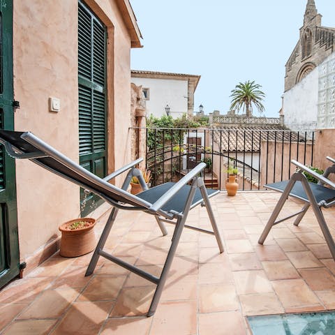 Soak up views of Sant Jaume d'Alcúdia from your secluded balcony