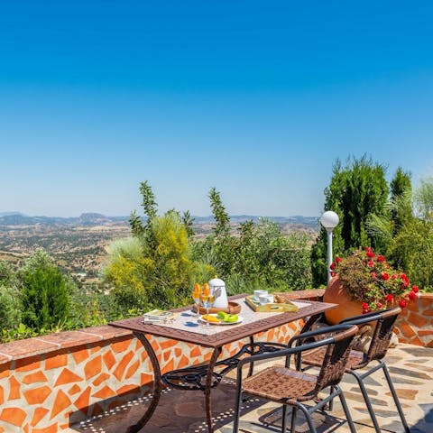 Start mornings with breakfast on the patio while gazing out at the rugged hills