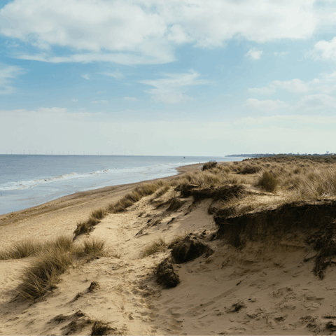 Enjoy the weather on the Norfolk coast, like Salthouse Beach six miles away