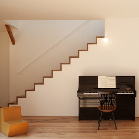 Entertain your family with a few tunes on the piano