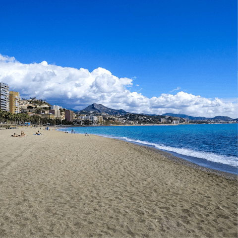 Walk twenty-two-minutes to Playa de la Malagueta and spend the day sunbathing
