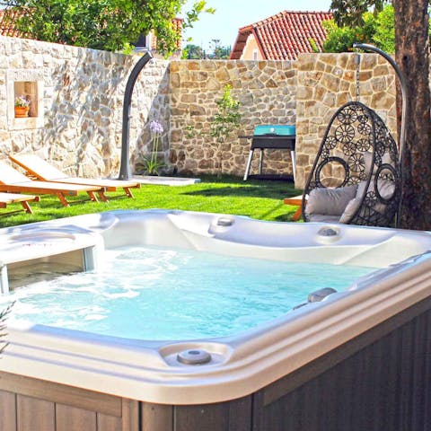 Enjoy a long and lovely soak in your private hot tub