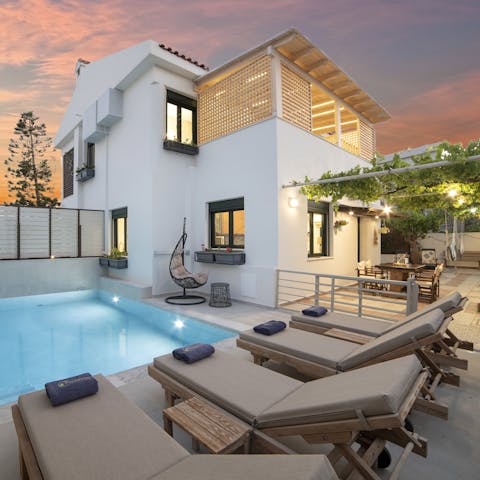 Relax on a plush sun lounger or take a sunset dip in the private pool