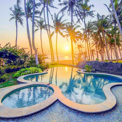 Watch the sunset from the uniquely shaped infinity pool 