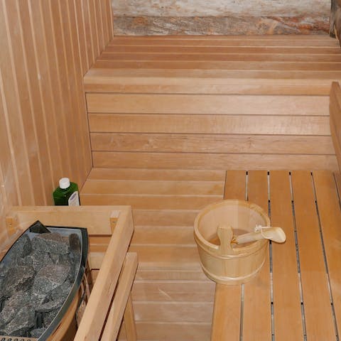 Relax and unwind in the in-house sauna 