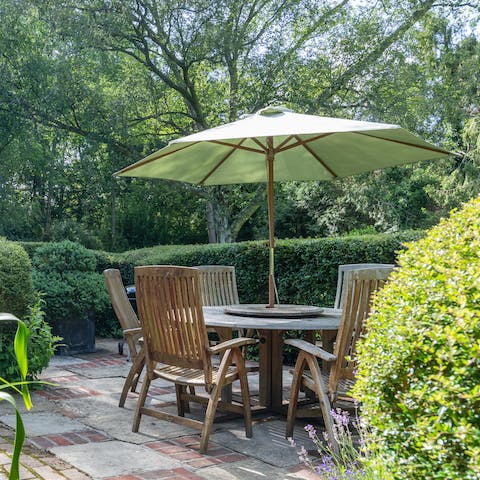 Enjoy a spot of afternoon tea in the lush garden