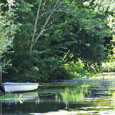 Hop in the rowing boat, especially provided for your use, and float along the peaceful river