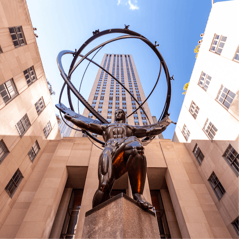 Visit the Rockefeller Center, a fourteen-minute walk away
