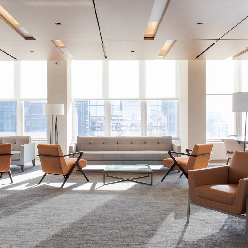 Chill out in the communal lounge with its incredible floor-to-ceiling windows