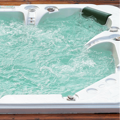 Take a long, luxurious soak under the stars in the outdoor hot tub