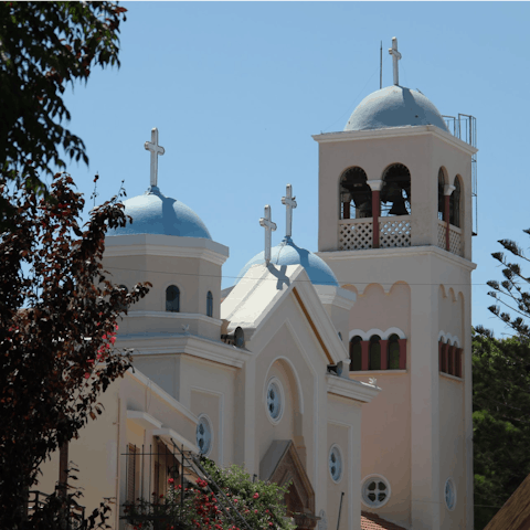 Explore Kos Town, a twenty-minute drive away