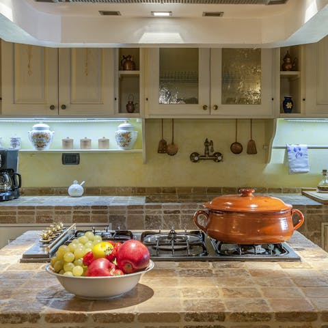 Rustle up traditional Italian dishes or an old favourite in the beautiful open-plan kitchen