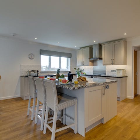 The spacious kitchen is perfect to cook as a group