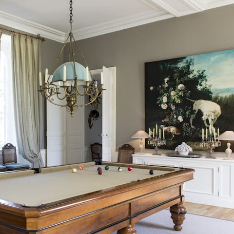 Embrace your competitive side at the on-site billiard room (upon request)