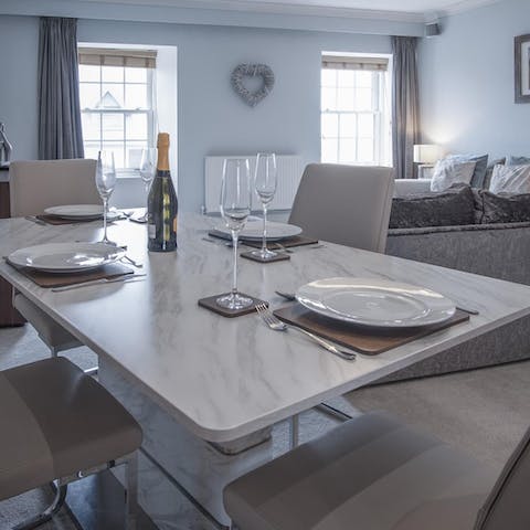 Share delicious meals at the elegant dining table