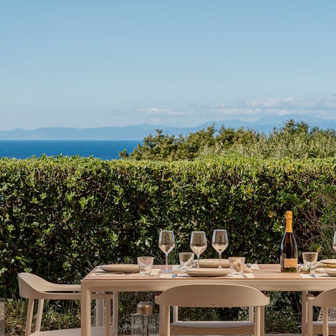 Soak up the sun on the terrace and drink in the sea views