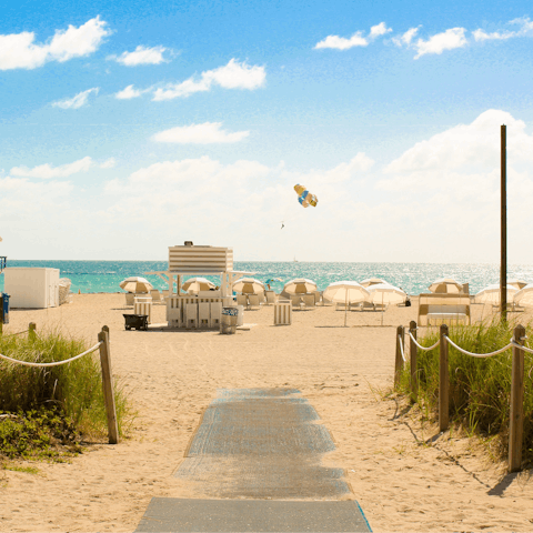 Spend an afternoon relaxing on the glamorous South Beach, a ten-minute drive away