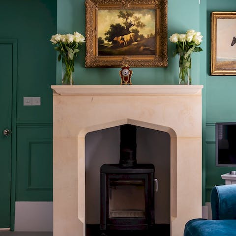 Cosy up around the log burner during the cooler evenings