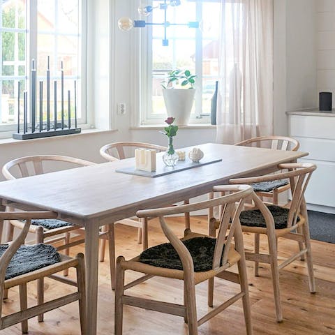 Enjoy family meals in the bright and cosy kitchen