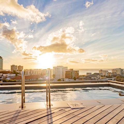 Take a dip in the communal swimming pool and marvel at the stunning views from the rooftop terrace 