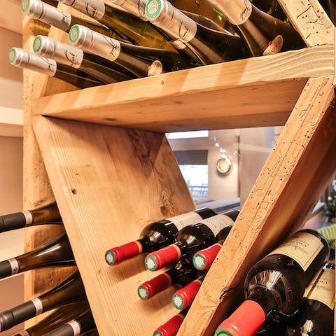 Sip a delicious glass of wine from the cellar 