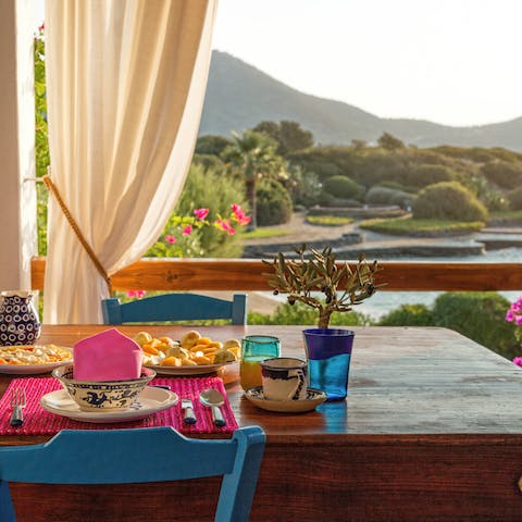 Eat indoors or out, with views across the water
