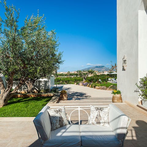Admire the view of the mountain from your pretty gardens and terraces