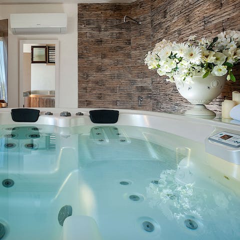 Treat yourself to some time in the home's indoor hot tub