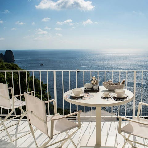 Sit back with a glass of wine and admire the sea views