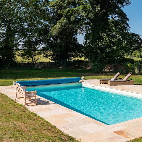 Make the most of the beautiful weather by going for a dip in the outdoor swimming pool