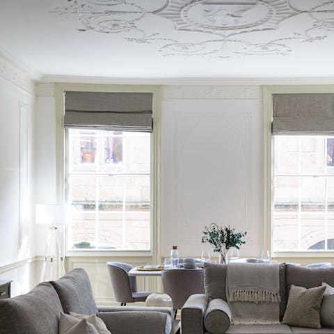 Get cosy in the plush living room and admire the stunning period features 