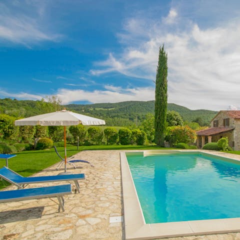 Relax by the pool enjoying picture-perfect views