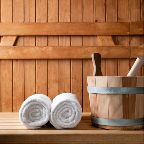 Stay toasty with your loved ones in the at-home sauna, after a chilly day out