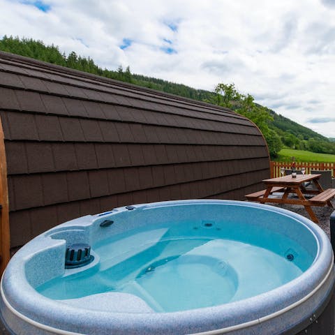 Enjoy a relaxing soak in your private hot tub after long days of hiking in the area