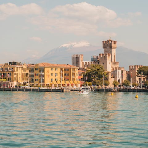 Visit the pretty village of Sirmione, fifteen minutes away by car