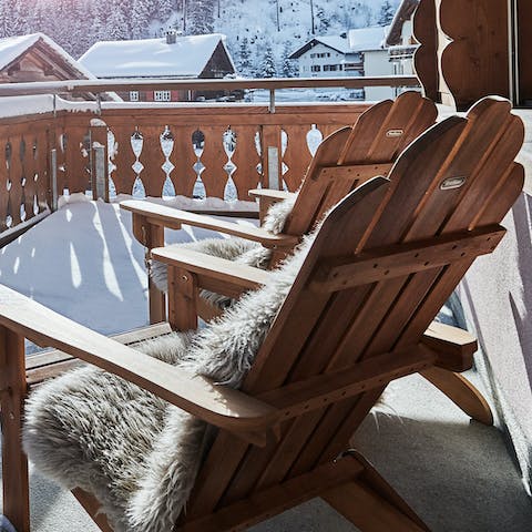 Sit out on the Adirondack chairs on your private balcony
