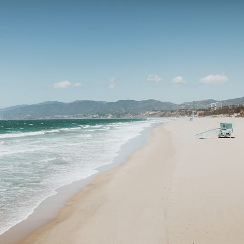 Enjoy leisurely days on Santa Monica beach, twenty-four minutes away by car