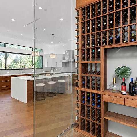 Pick out your favourite tipple or try something new from the floor-to-ceiling wine cellar
