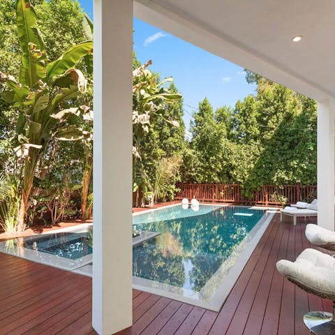 Soak up the sun by relaxing on a lounger or swimming in the zero edge pool 