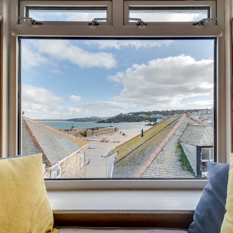 Curl up on the window seat and admire the sea views
