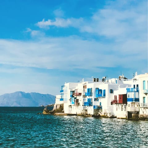 Explore the streets of Mykonos old town – a short drive away