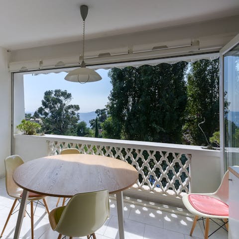 Enjoy your morning coffee on the sunny balcony with leafy views