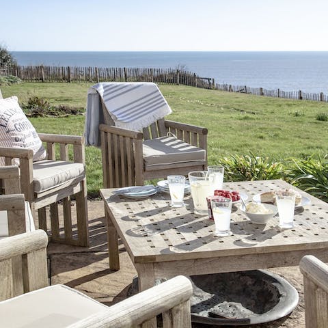 Enjoy post-beach drinks on the terrace with the serene seascape as your soothing backdrop