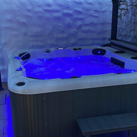 Indulge in a long soak in the home's private hot tub
