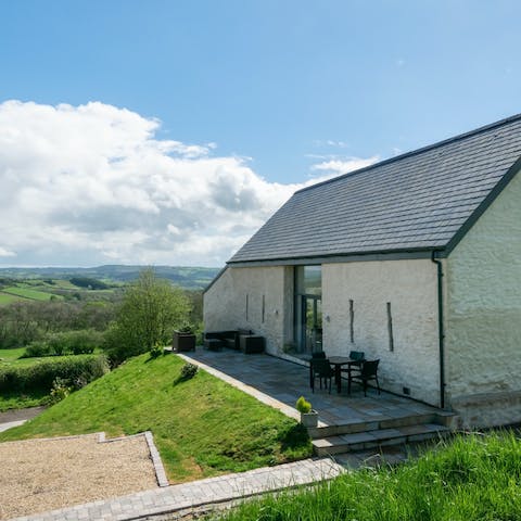 Gaze across the fields and valleys from your converted farm building