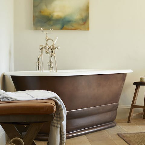 Take a soak in the master bedroom's freestanding bath