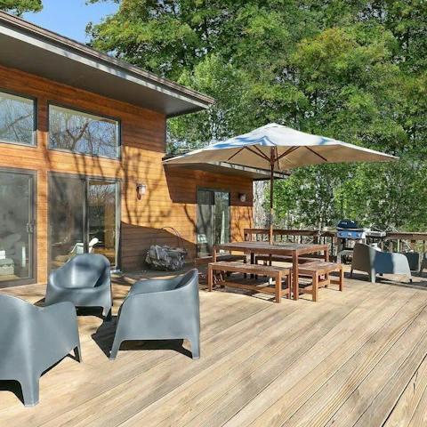 Spend your days lazing on the home's expansive deck